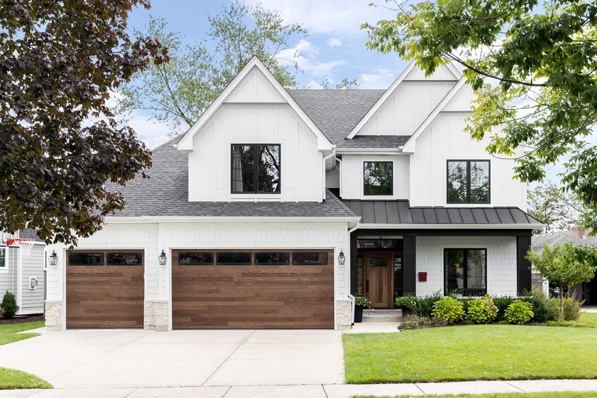 Modern home with wood panel garage door installation in Elkhart, IN